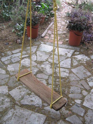 a low cast garden swing can bring so much pleasure to the garden