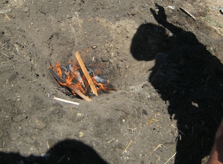 a biochar fire needs to be fed slowly and continually