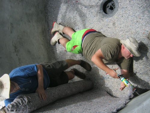 glueing the bottom of the pond walls