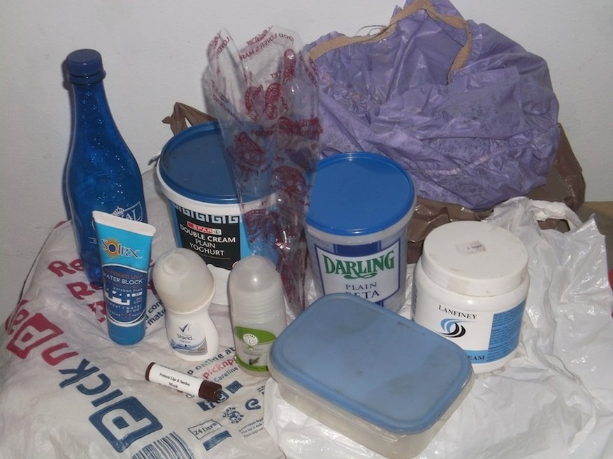 blanketed in silence: these items all come into contact with my body or food. Only two were labelled: the cream was recycle code 5, and the pick n pay bag was PE HD recycle code 2.