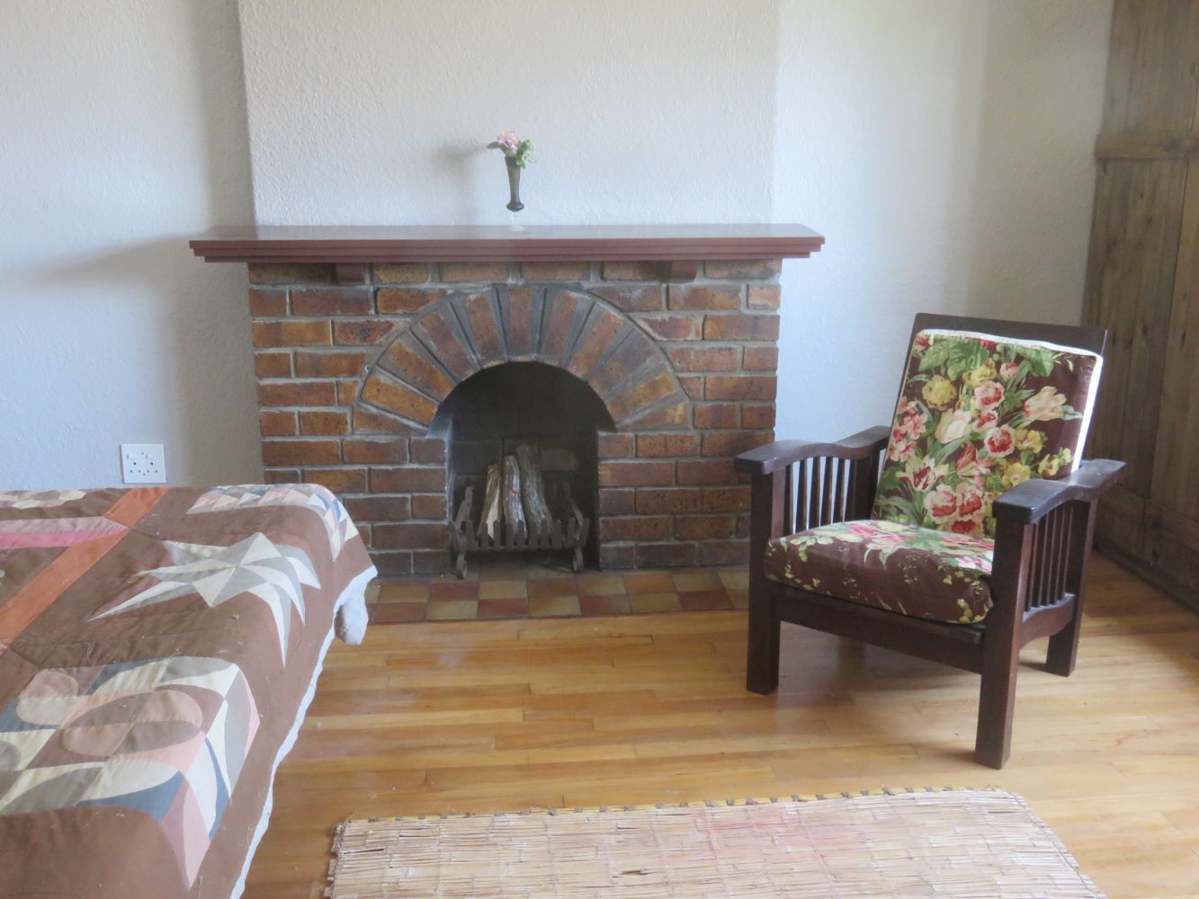 The front bedroom with its working fireplace could double as a third reception room.