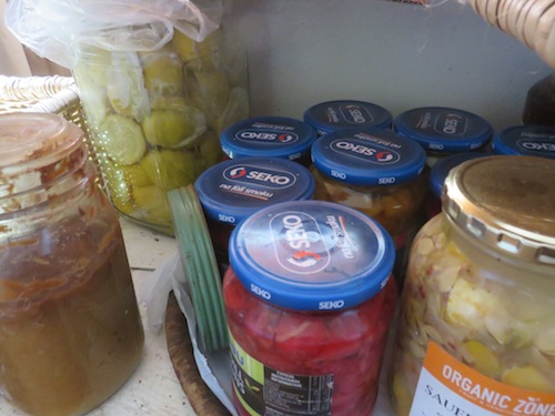 Some of the crazy stuff I've started making at home, from left to right: pear paste, Moroccan lemon preserve, sweet peach pickles, numnum in brine, pumpkin in brine