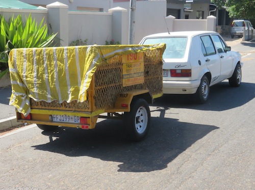 A hired trailer full of shredded garden waste