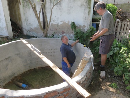 how to conserve water in a tank purposed for fish, people and rain water storage