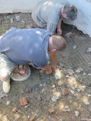 wire mesh is raised on small stones