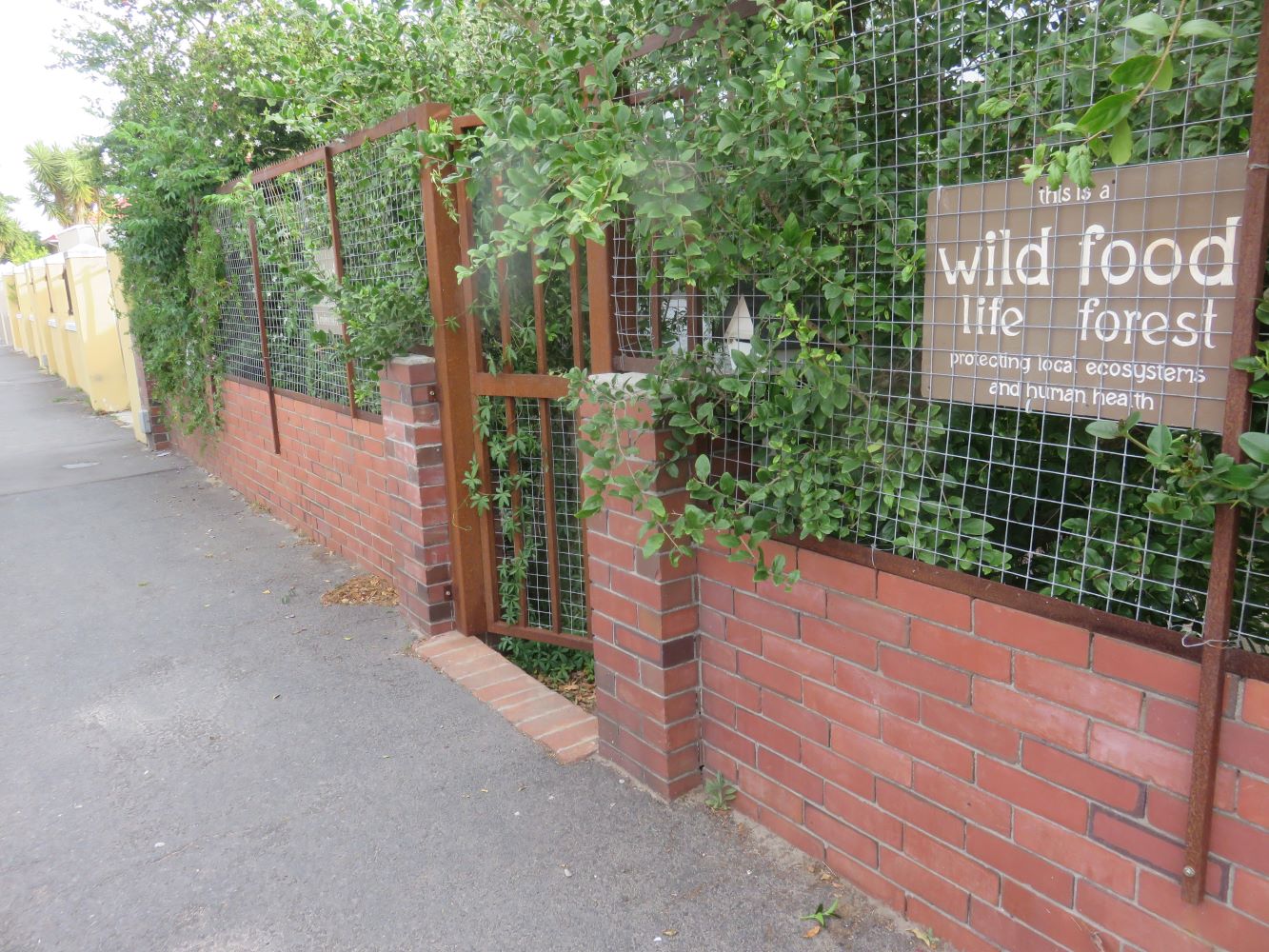 The street view of the wildlife garden full of native fruit trees.