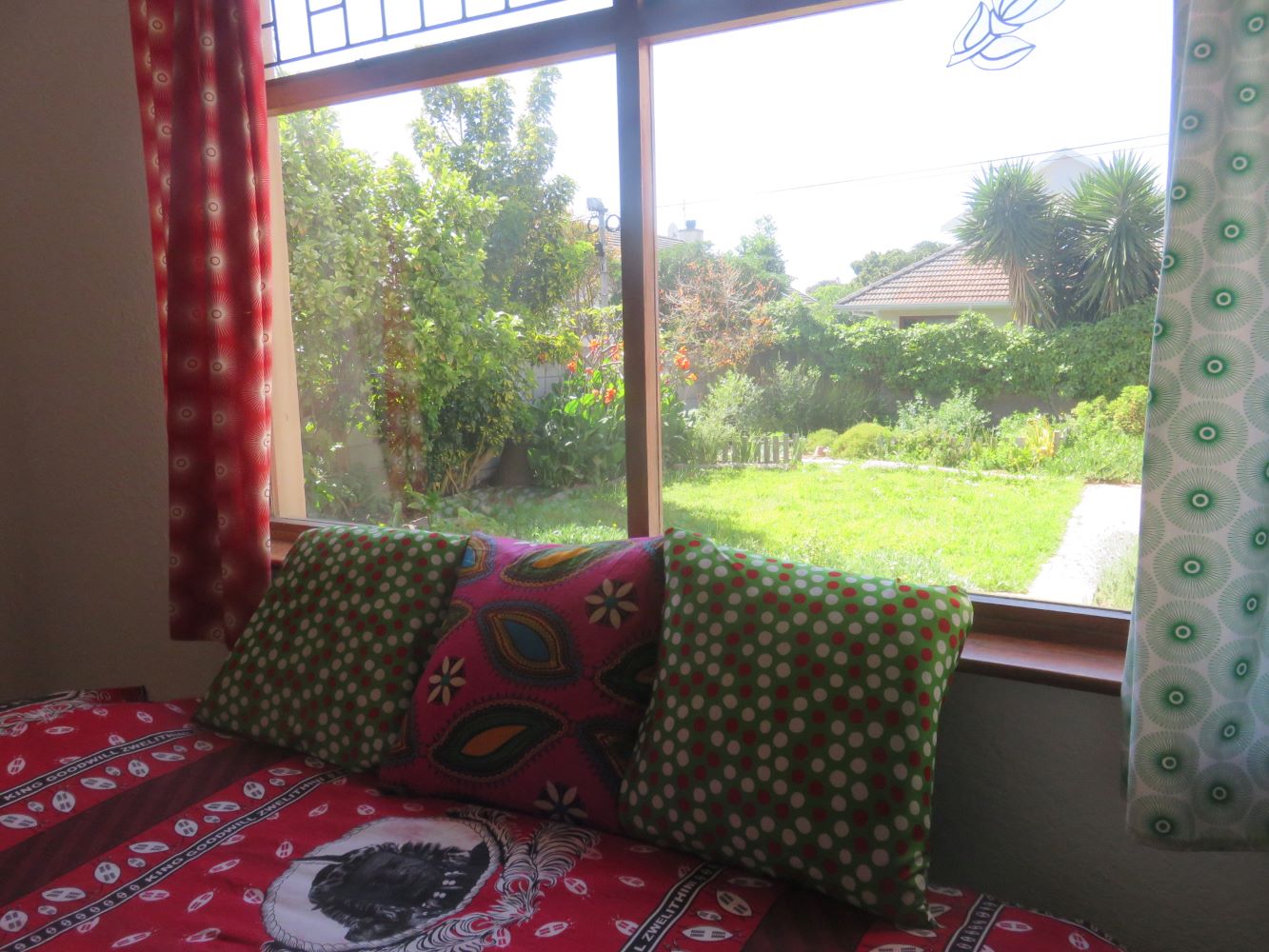 The third, and back bedroom of the house looks out on the back garden.