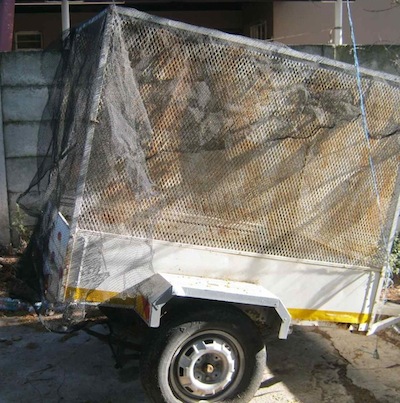 a net over the trailer protects our six packs from birds scratching