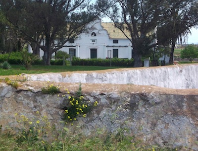 On this dry west coast farm the animal enclosure wall is not capped