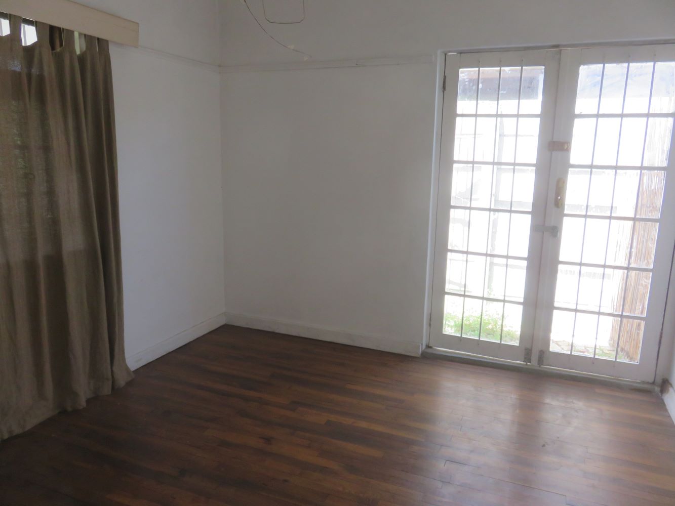 The front room of the rental flat in Goodwood, still unfurnished. Its been a long process in which we've done everything by hand, ourselves or with the help of friends.